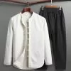 white-top-and-black-pants